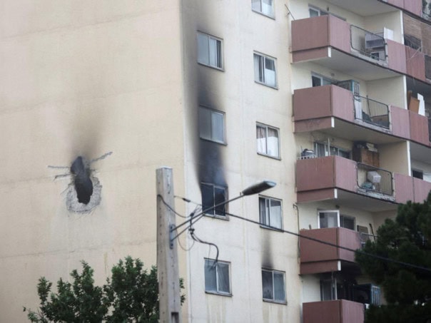 Iran, Teheran, pogodjena zgrada, x